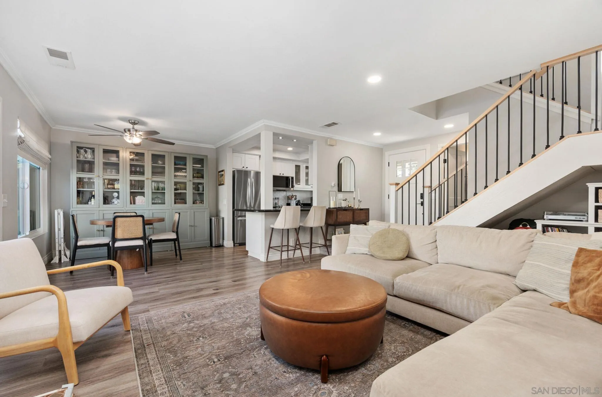 1971 Azure Way Encinitas, CA 92024 - Photo 8 of 30 a living room with furniture and a dining table with wooden floor