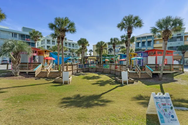 a view of swimming pool with outdoor seating