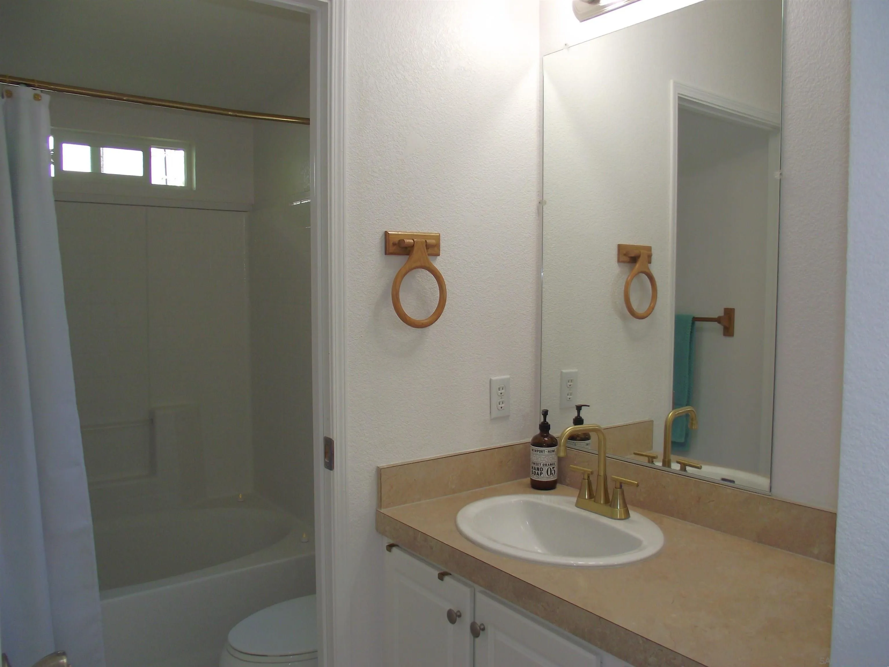 35109 Highway 79, Unit SPC/ #15 Warner Springs, CA 92086 - Photo 16 of 35 a bathroom with a sink and mirror