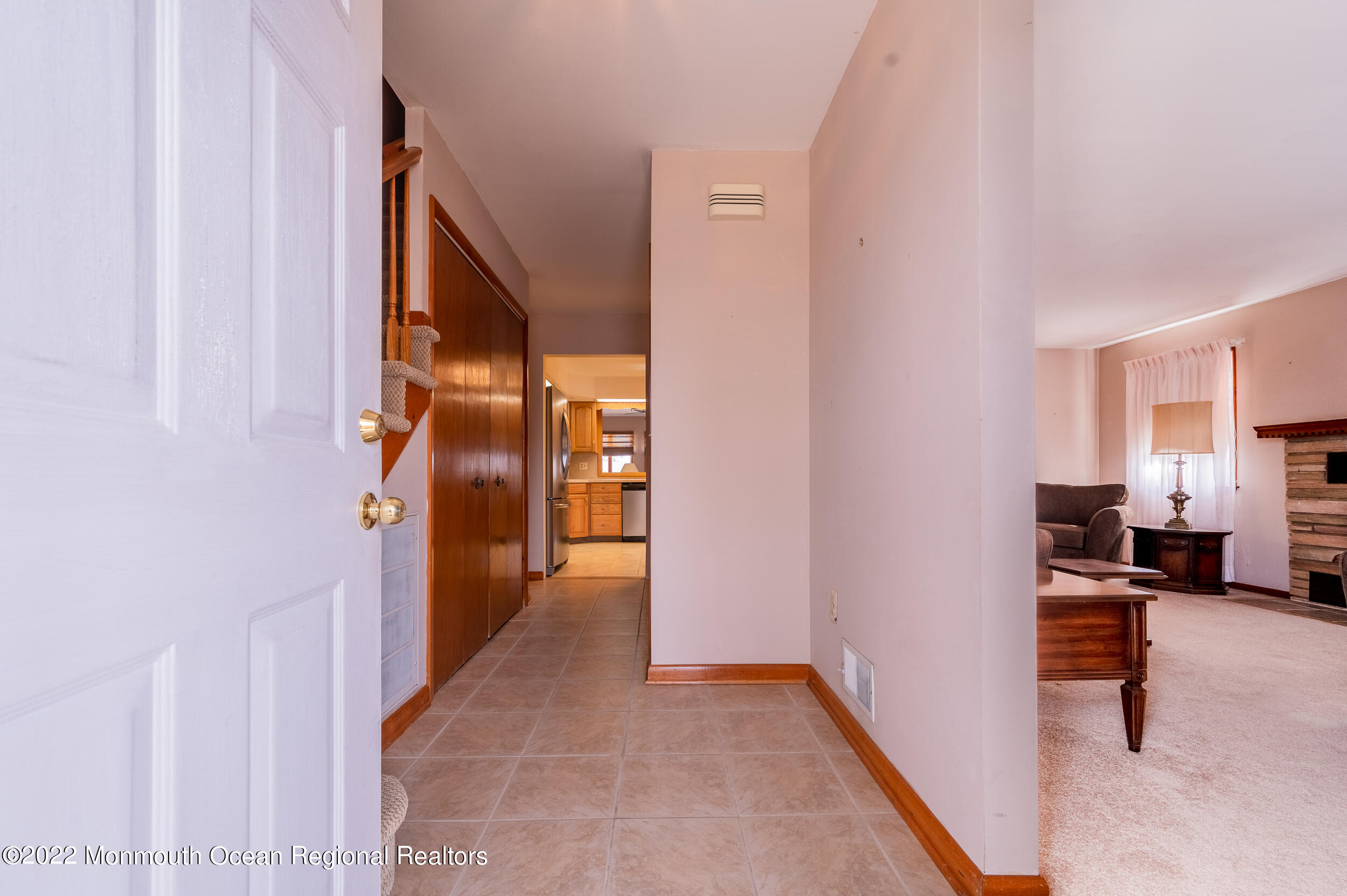 23 Neptune Road Toms River, NJ 08753 - Photo 18 of 36 a view of a hallway with kitchen area