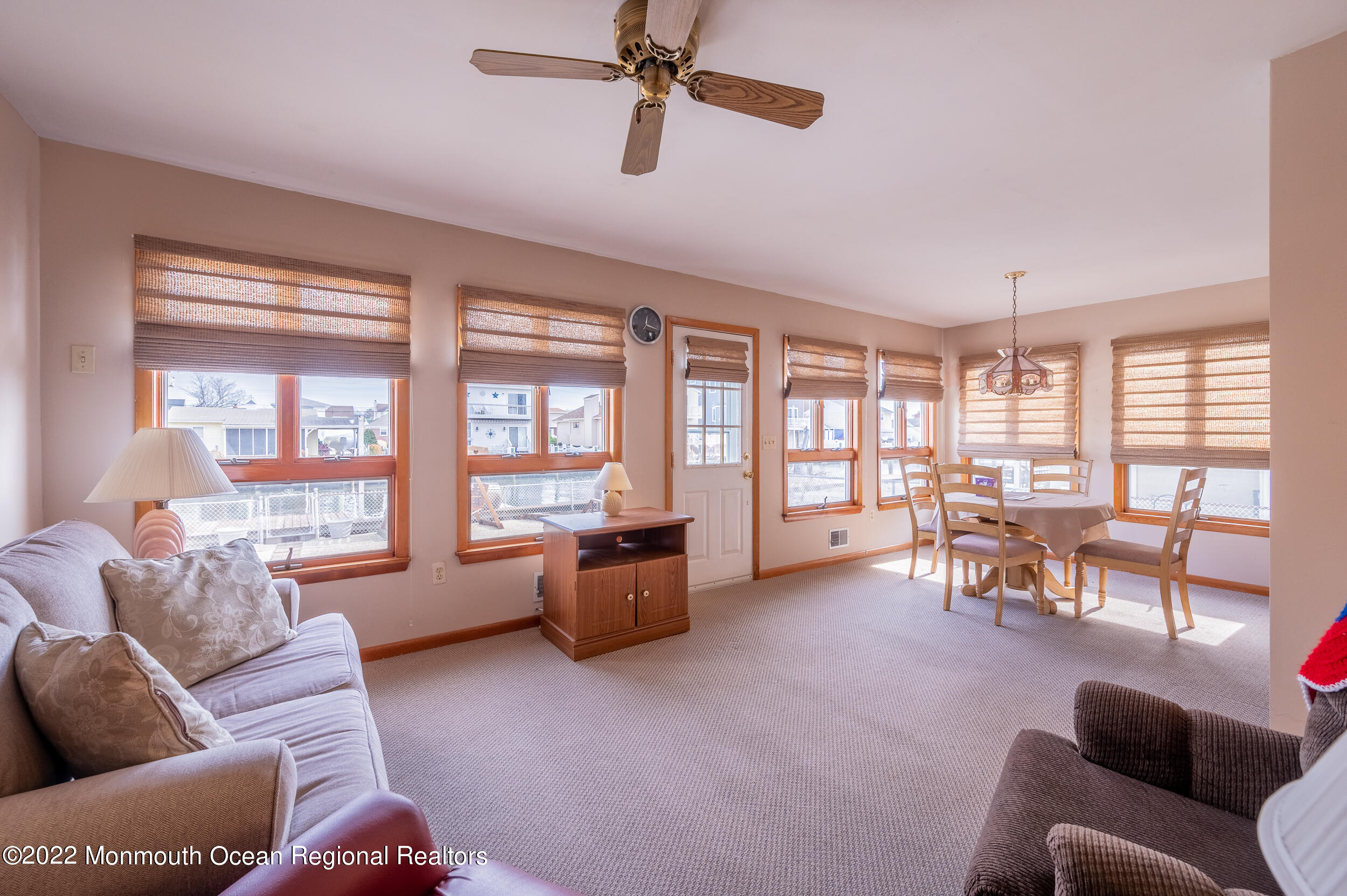 23 Neptune Road Toms River, NJ 08753 - Photo 10 of 36 a living room with furniture and a large window