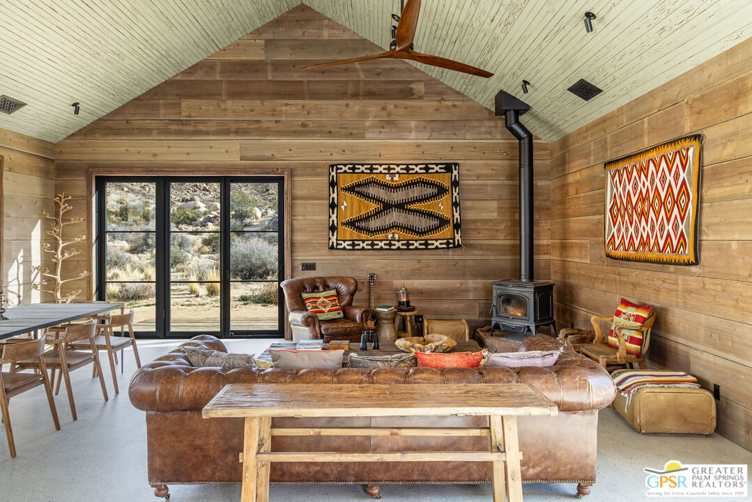 1653 Roadrunner Rut Pioneertown, CA 92268 - Photo 23 of 60 a view of kitchen with stainless steel appliances kitchen island granite countertop a stove and a sink