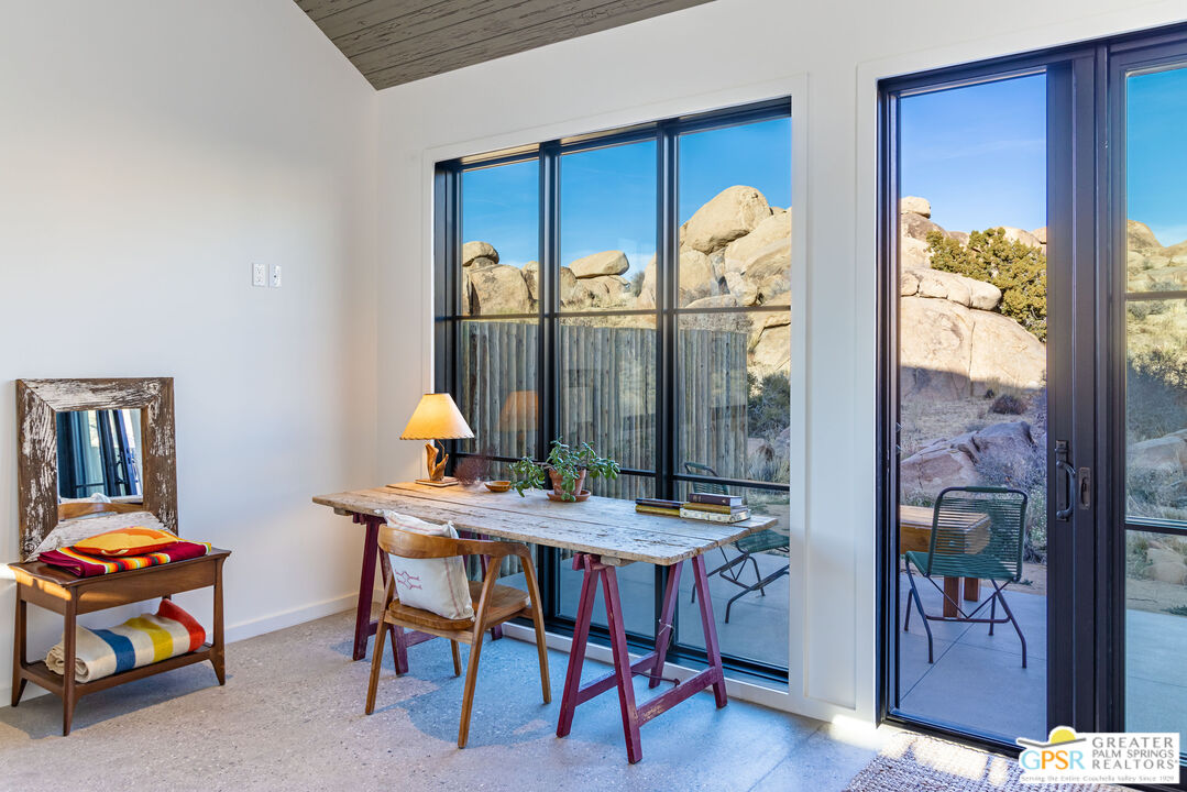 1653 Roadrunner Rut Pioneertown, CA 92268 - Photo 33 of 60 a workspace with furniture and window