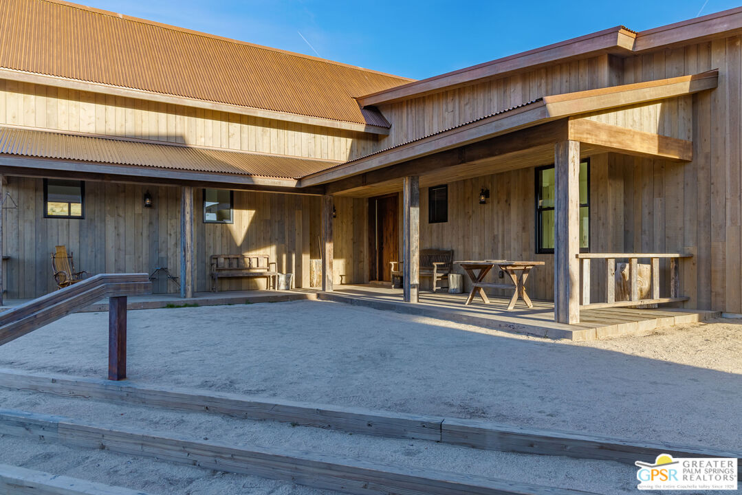 1653 Roadrunner Rut Pioneertown, CA 92268 - Photo 36 of 60 a view of a house with door