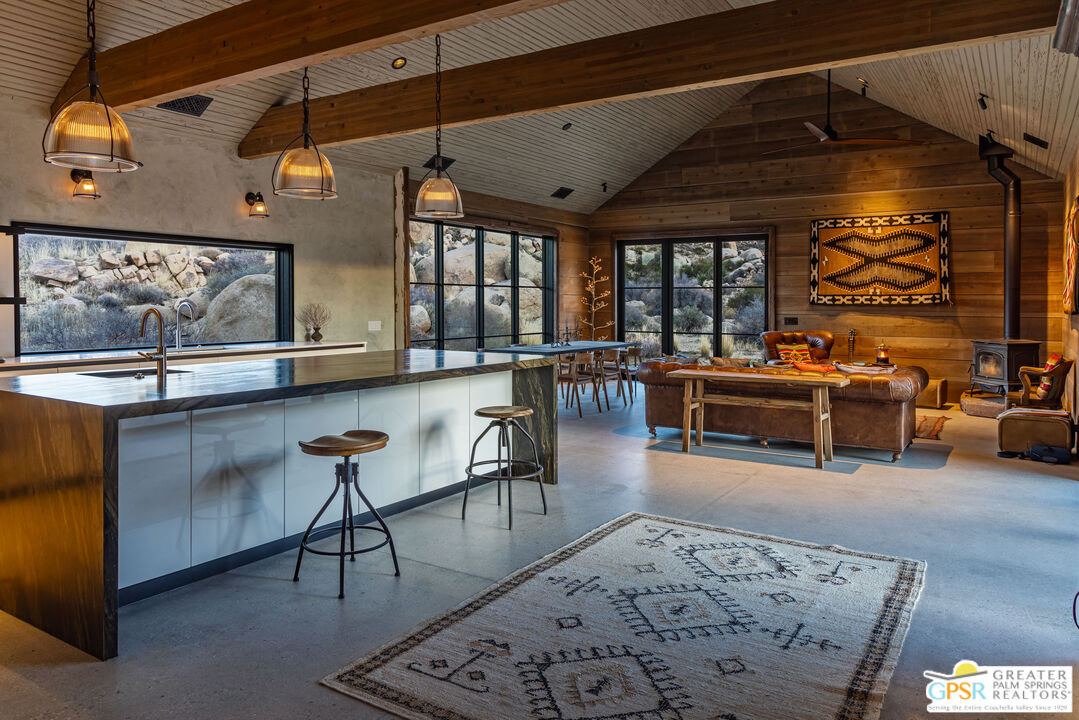 1653 Roadrunner Rut Pioneertown, CA 92268 - Photo 4 of 60 a living room with furniture and a large window