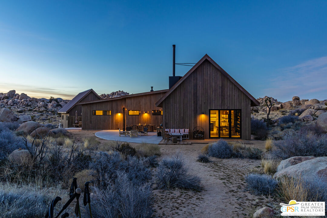 1653 Roadrunner Rut Pioneertown, CA 92268 - Photo 57 of 60 a view of a house with a big yard