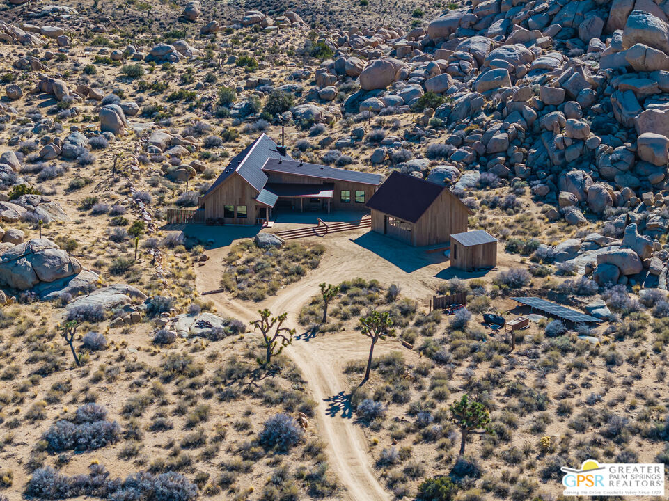 1653 Roadrunner Rut Pioneertown, CA 92268 - Photo 59 of 60 an aerial view of a house with a yard