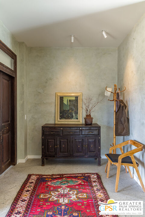 1653 Roadrunner Rut Pioneertown, CA 92268 - Photo 10 of 60 a living room with furniture and a rug