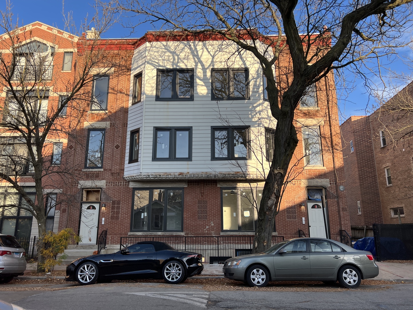 911 South Miller Street, Unit G Chicago, IL 60607 - Photo 1 of 11 a car parked in front of a building