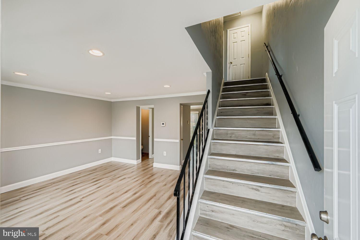 2610 Hallam Court, Unit 2610 Windsor Mill, MD 21244 - Photo 3 of 17 a view of an entryway with wooden floor