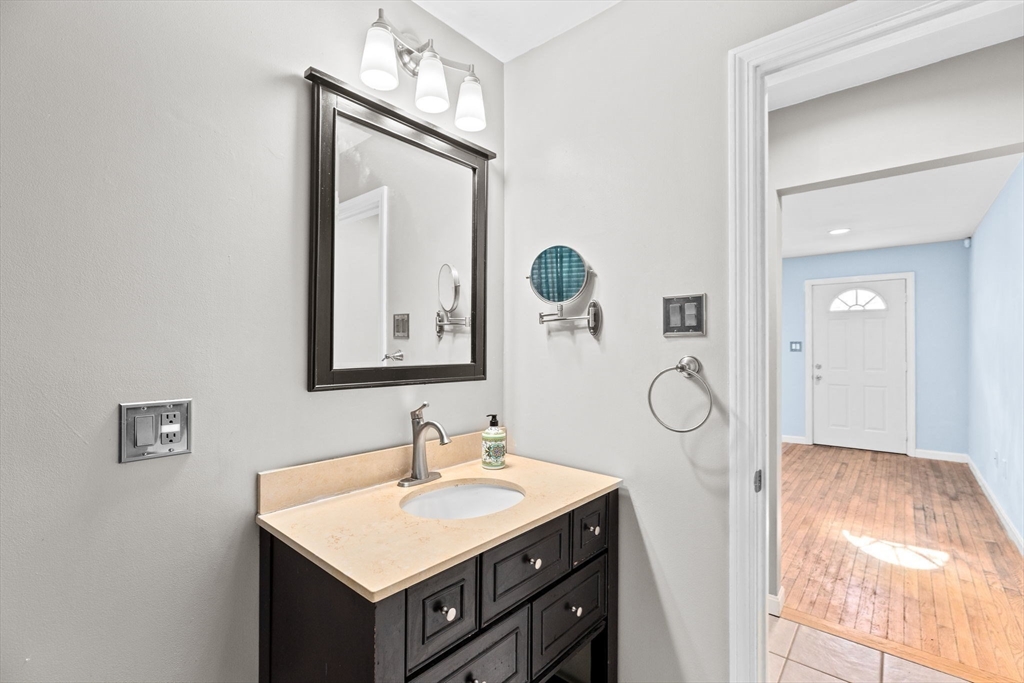 973 Point Road Marion, MA 02738 - Photo 15 of 33 a bathroom with a sink vanity and mirror