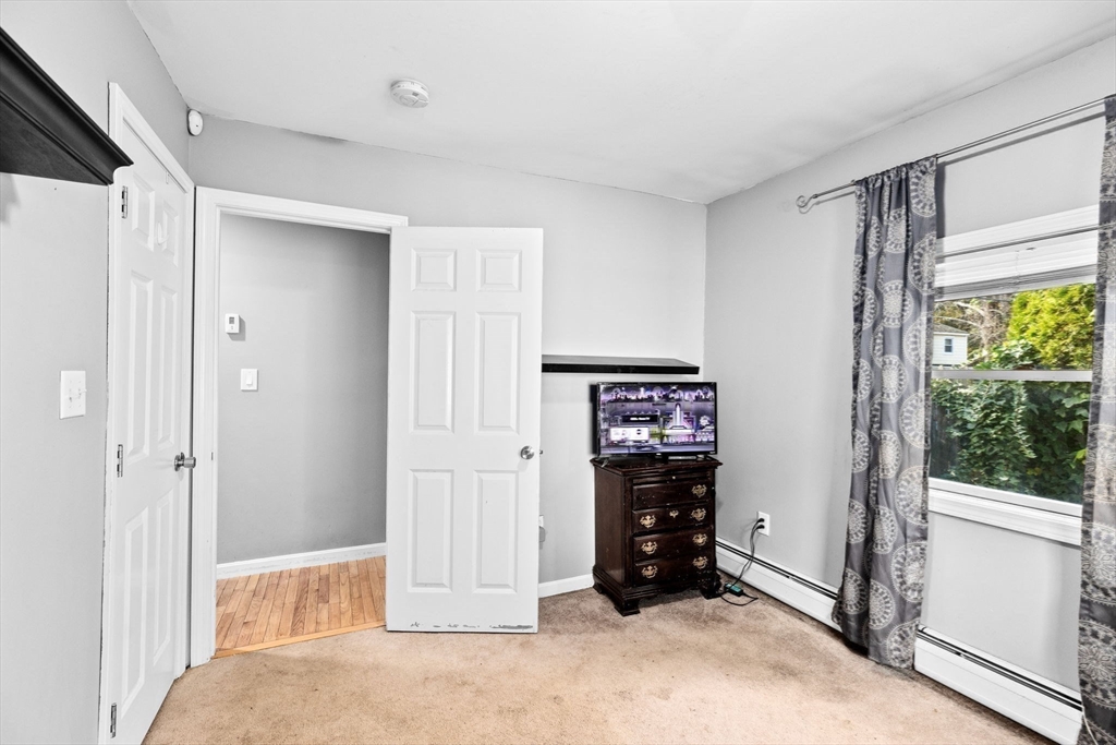 973 Point Road Marion, MA 02738 - Photo 20 of 33 a view of an empty room with a window