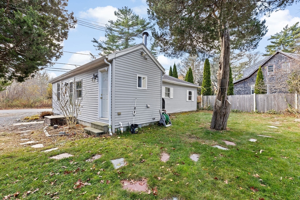 973 Point Road Marion, MA 02738 - Photo 26 of 33 a view of a house with a yard