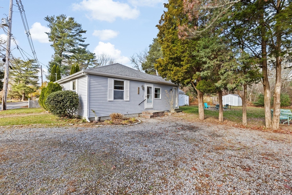 973 Point Road Marion, MA 02738 - Photo 28 of 33 a view of a house with a backyard