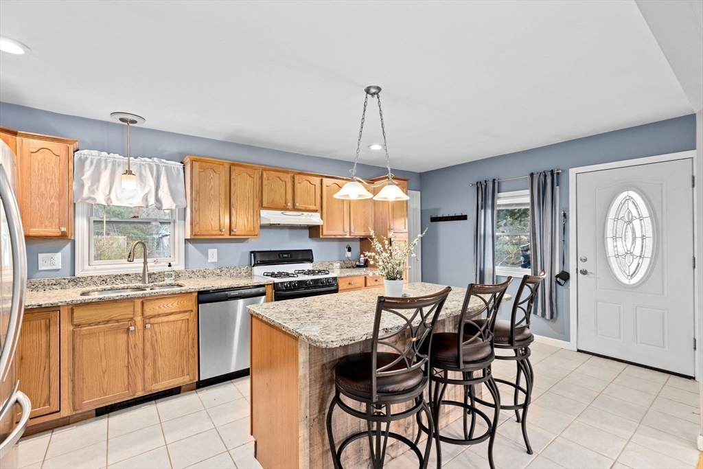 973 Point Road Marion, MA 02738 - Photo 6 of 33 a dining table with chairs and window