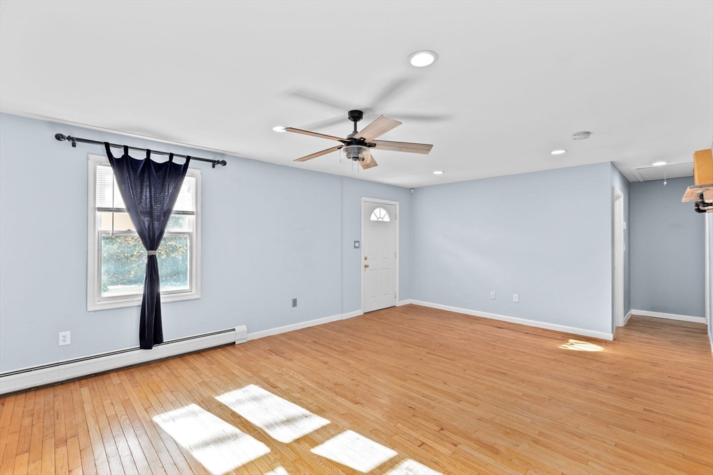973 Point Road Marion, MA 02738 - Photo 9 of 33 a view of a livingroom with a ceiling fan and window