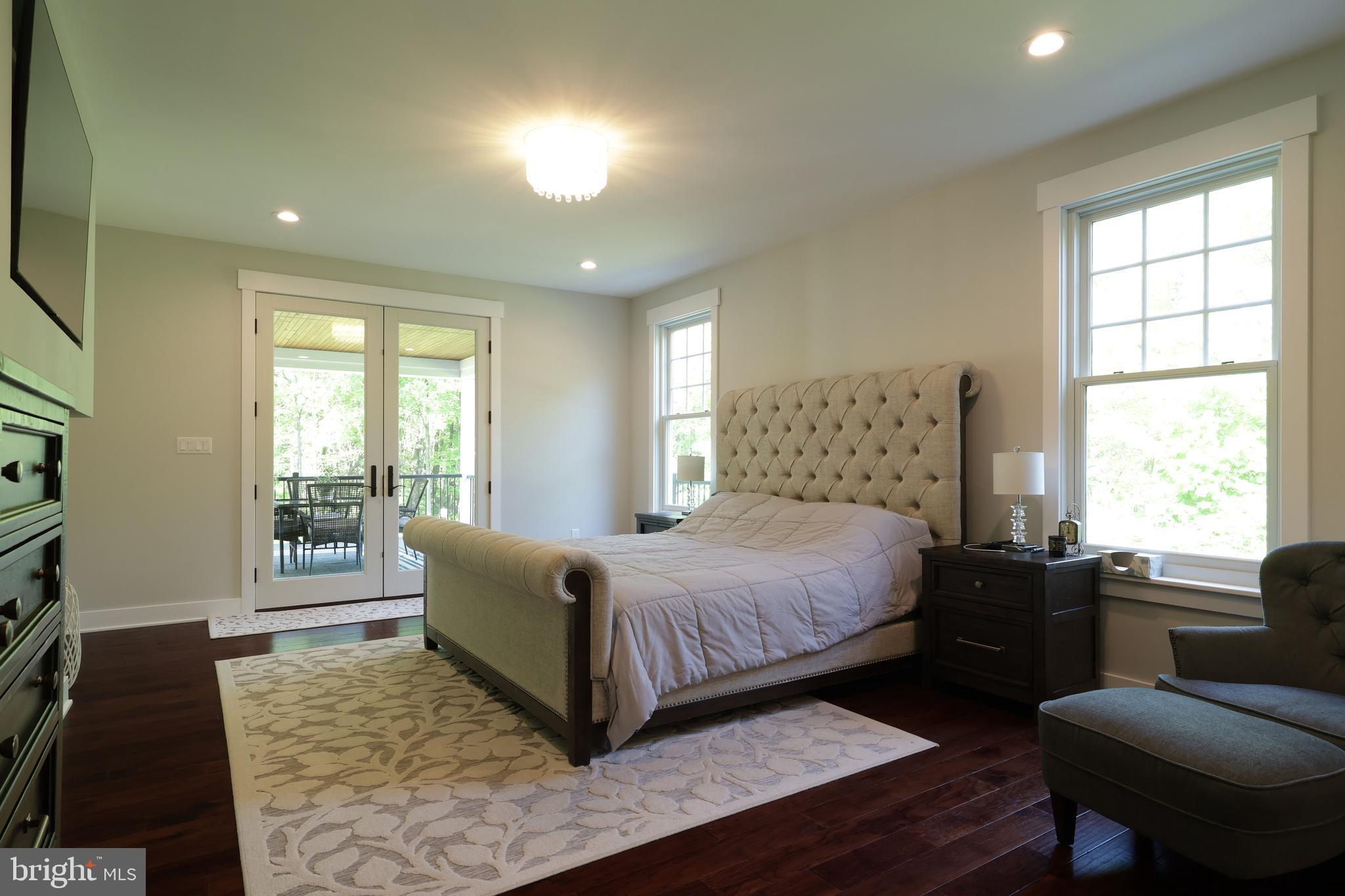 518 Two Mile Road Howard, PA 16841 - Photo 30 of 84 a bedroom with a bed and wooden floor