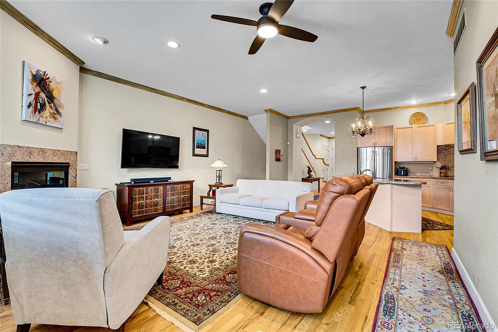 566 Josephine Street Denver, CO 80206 - Photo 11 of 45 a living room with furniture and a flat screen tv