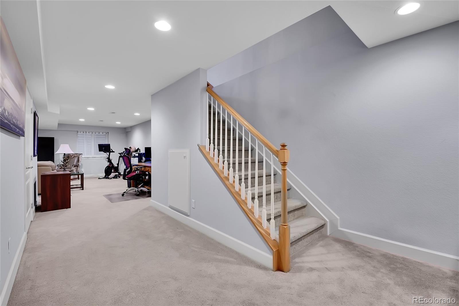 566 Josephine Street Denver, CO 80206 - Photo 25 of 45 a view of a hallway with workspace