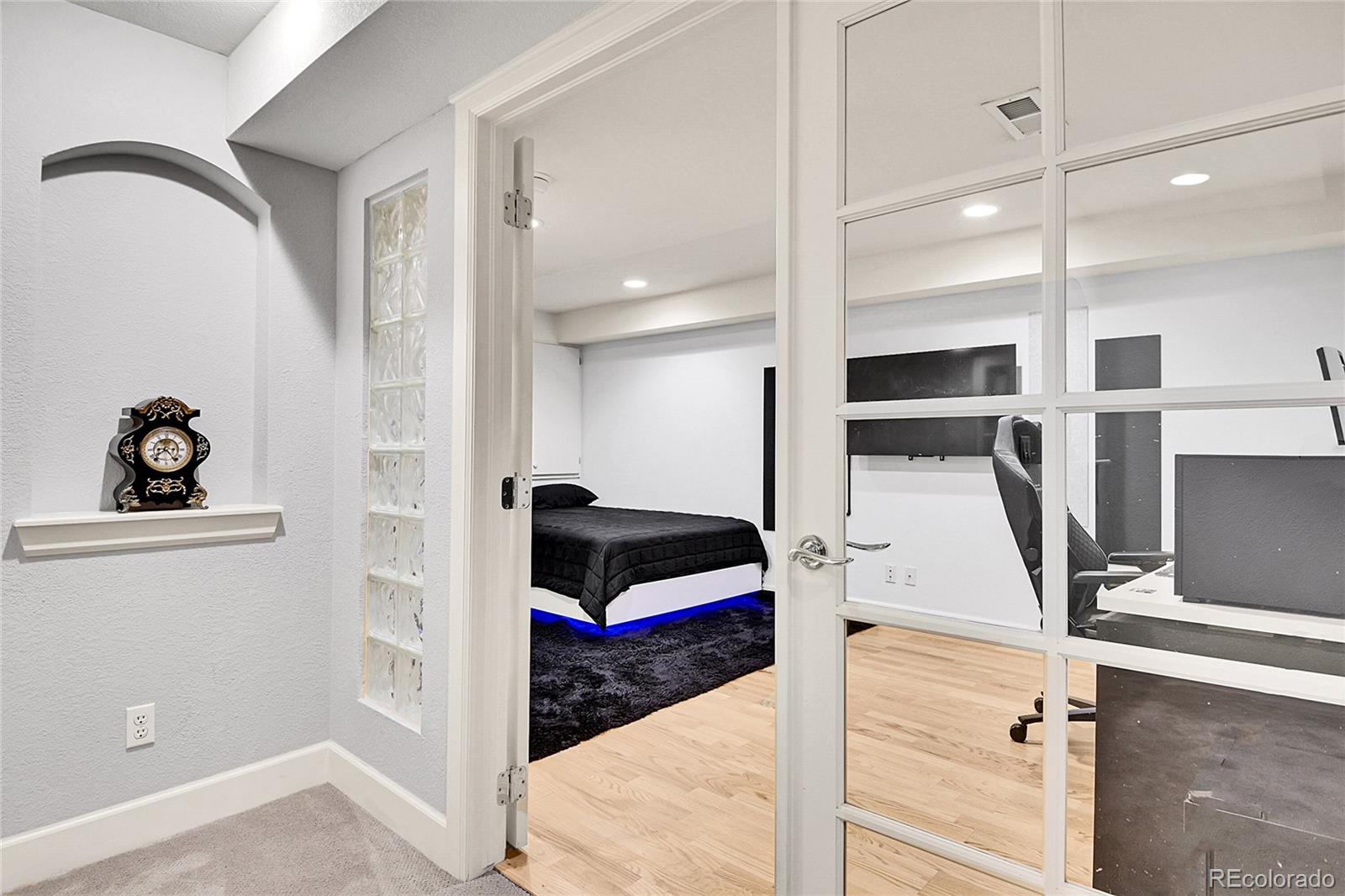 566 Josephine Street Denver, CO 80206 - Photo 26 of 45 a hallway with a view of living room