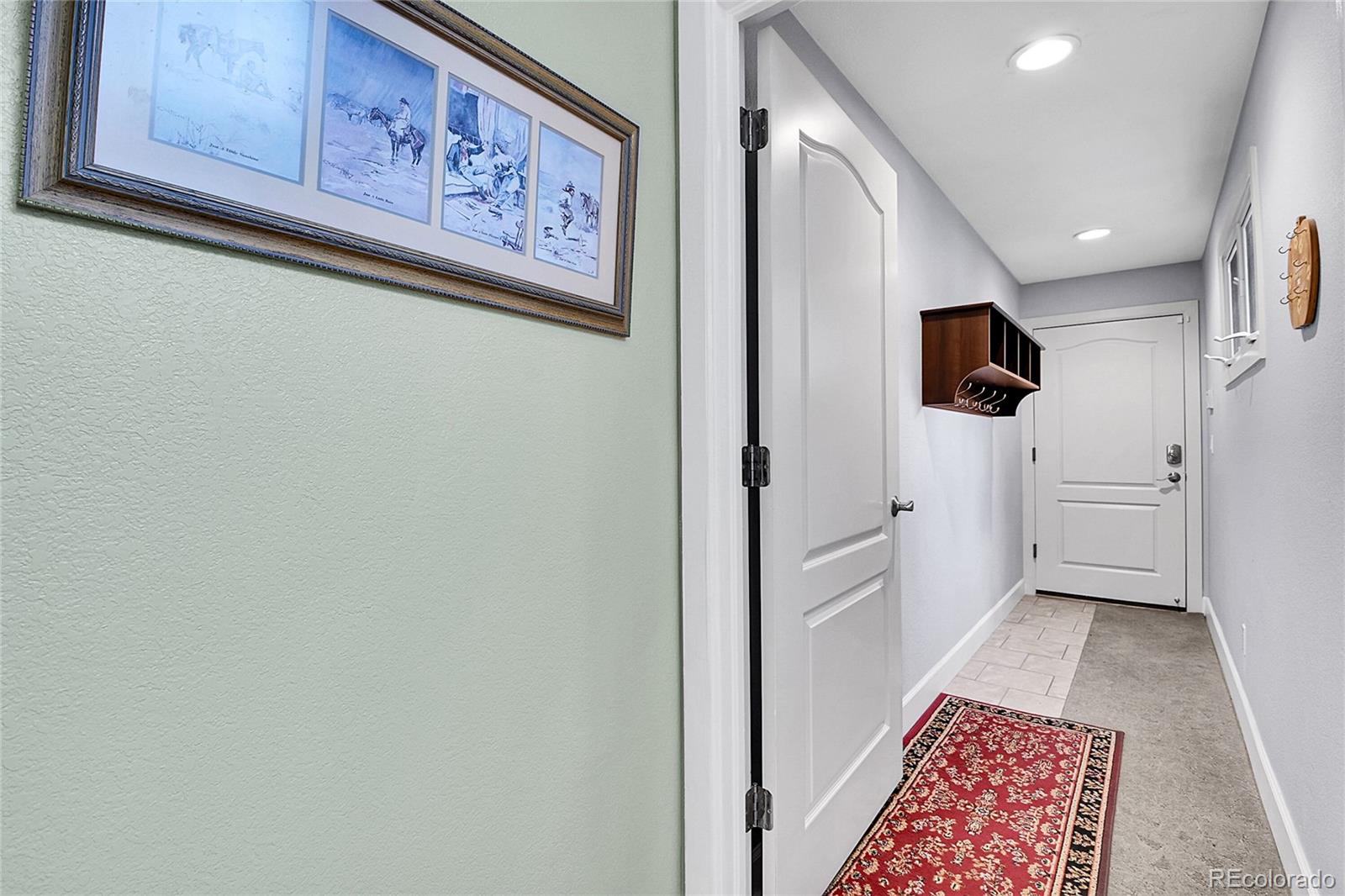 566 Josephine Street Denver, CO 80206 - Photo 33 of 45 a walk in closet with wooden floor