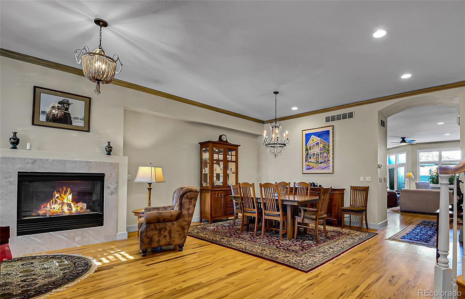 566 Josephine Street Denver, CO 80206 - Photo 4 of 45 a living room with furniture a fireplace and a fireplace