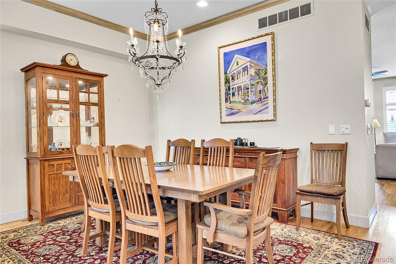566 Josephine Street Denver, CO 80206 - Photo 6 of 45 a view of a dining room with furniture window and outside view