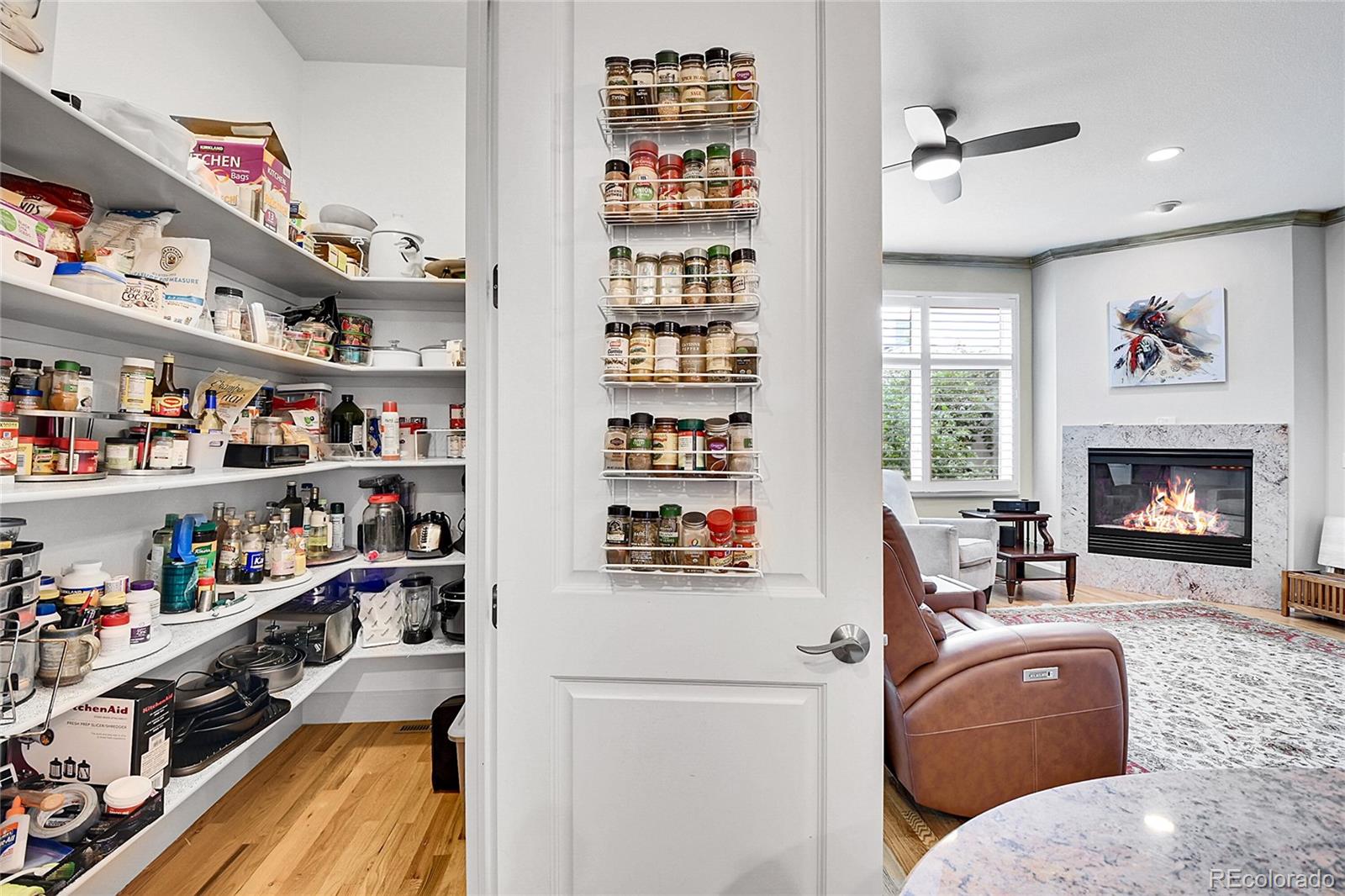 566 Josephine Street Denver, CO 80206 - Photo 9 of 45 a living room with furniture cabinets and a window