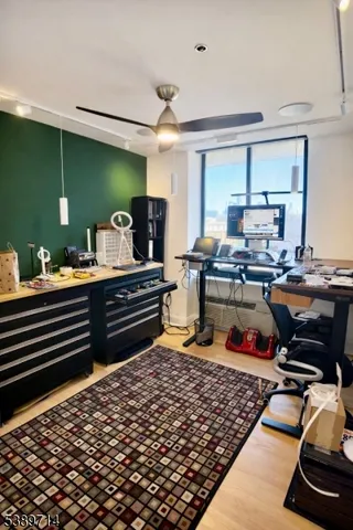 a room with gym equipment and a table