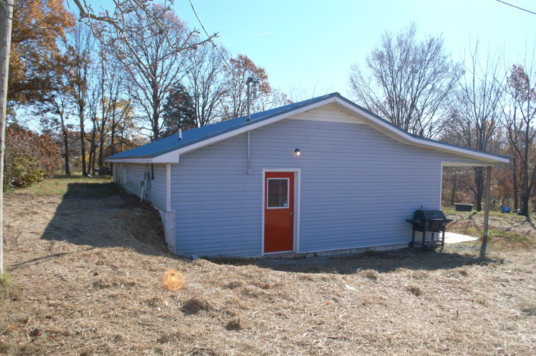 2151 Baggett Road Palmyra, TN 37142 - Photo 2 of 29 a front view of a house with a yard