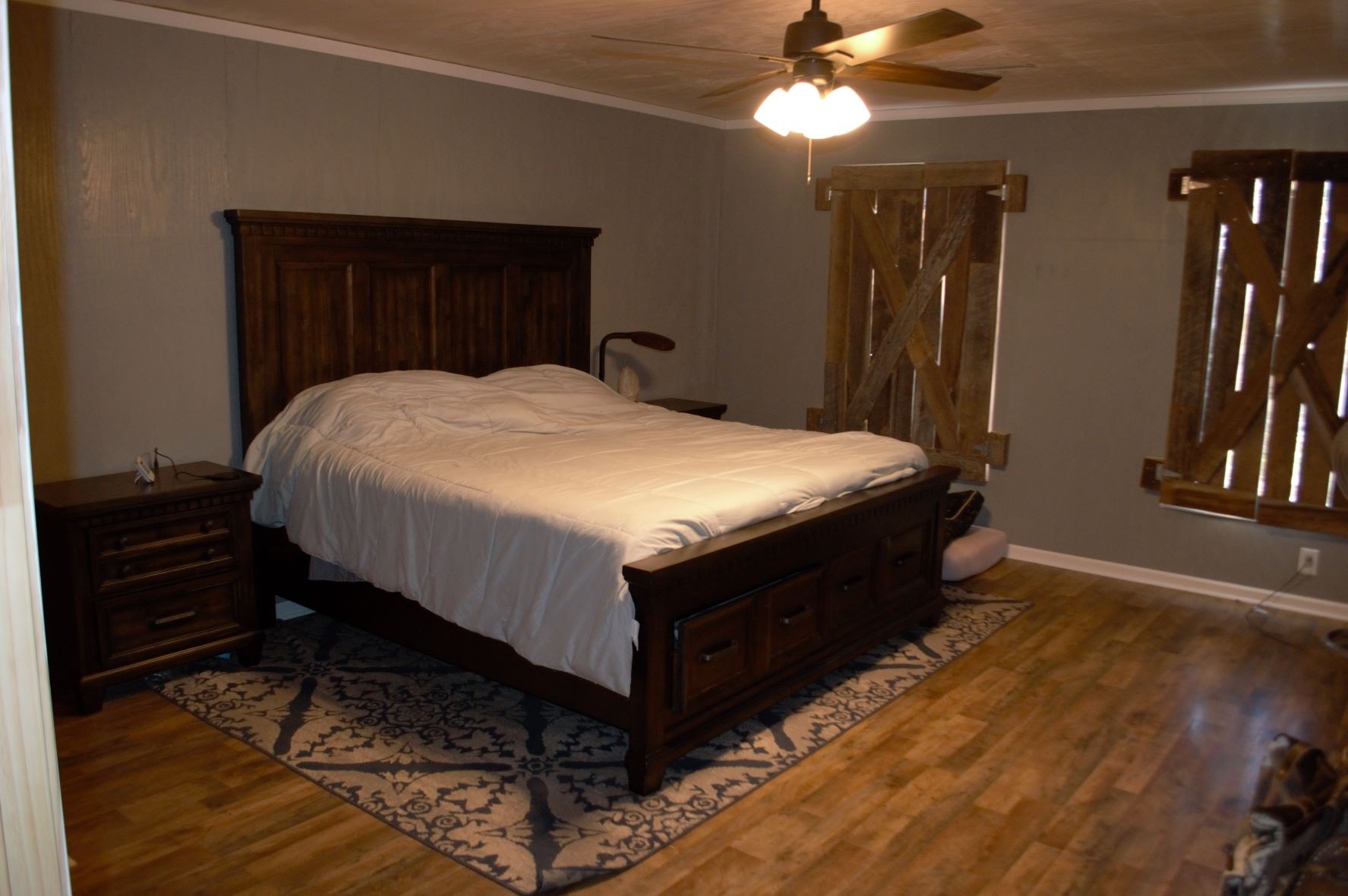 2151 Baggett Road Palmyra, TN 37142 - Photo 12 of 29 a bed sitting in a bedroom next to a window