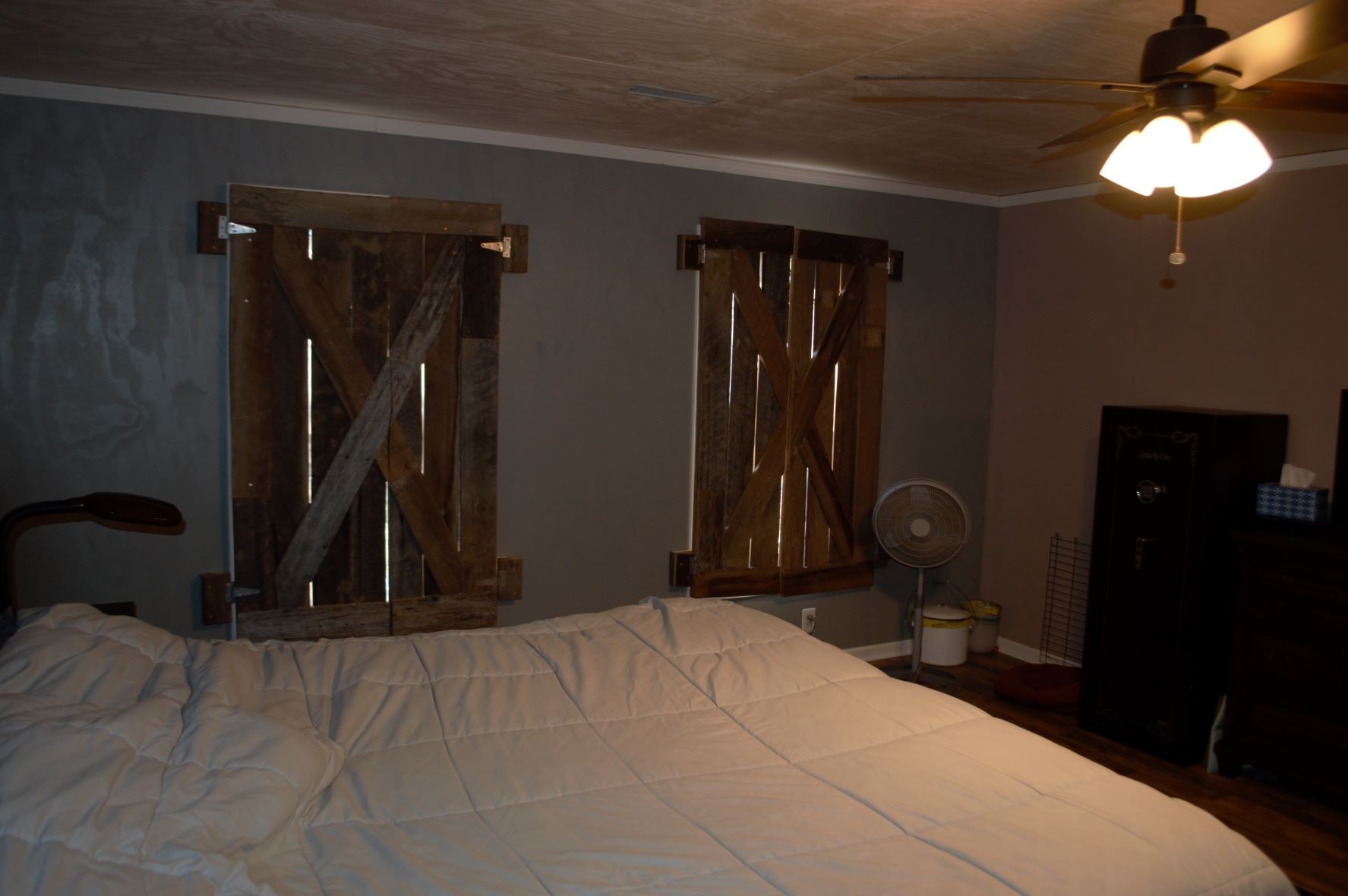 2151 Baggett Road Palmyra, TN 37142 - Photo 13 of 29 a bedroom with a bed and a chandelier