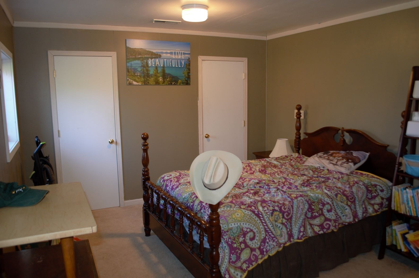 2151 Baggett Road Palmyra, TN 37142 - Photo 18 of 29 a bedroom with a bed and a table in it