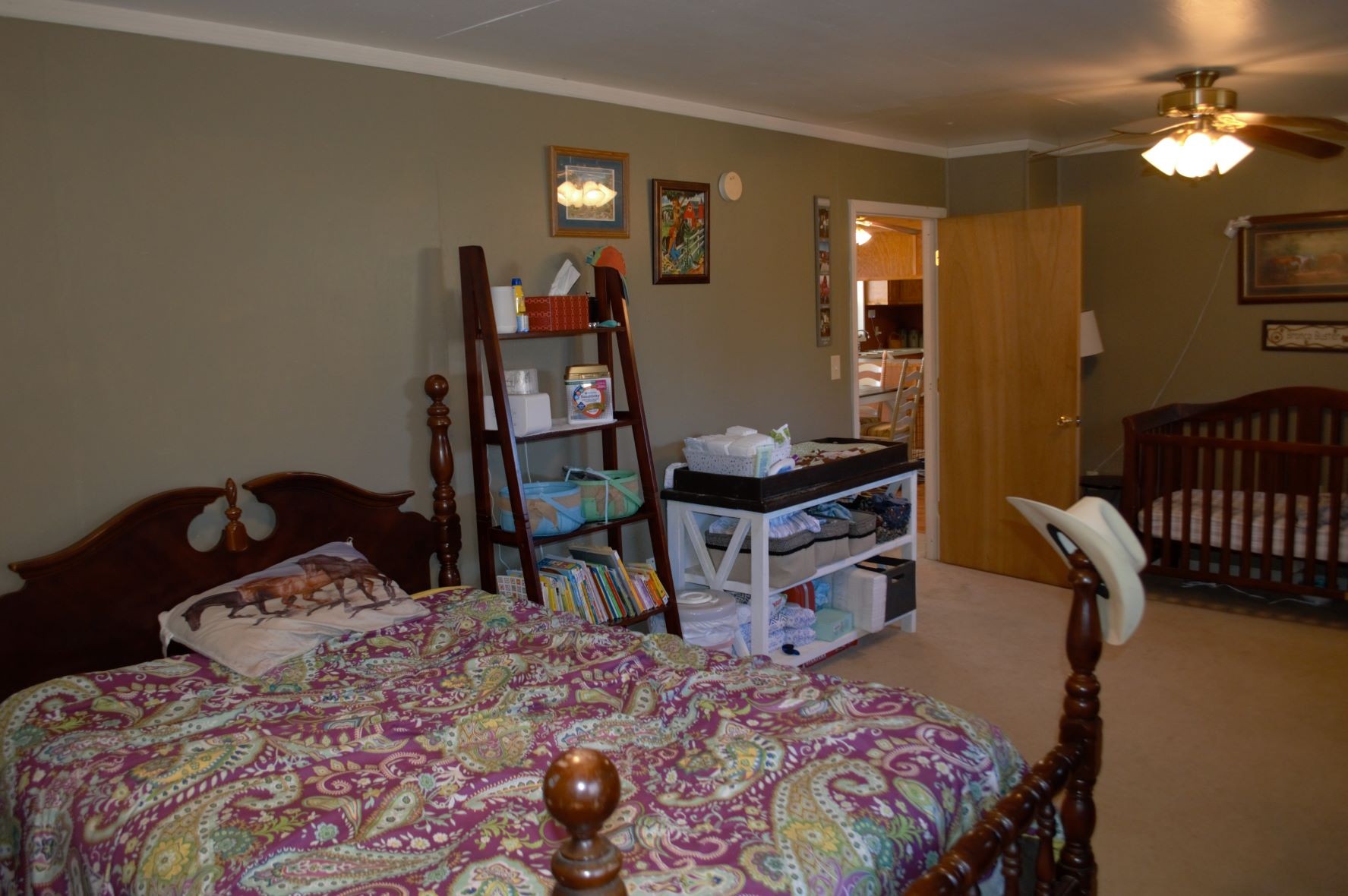 2151 Baggett Road Palmyra, TN 37142 - Photo 19 of 29 a bedroom with a bed and wooden floor