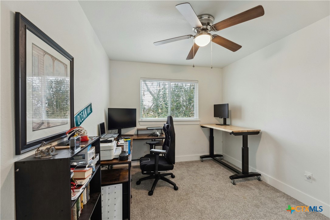 1952 Royal Loop Belton, TX 76513 - Photo 9 of 14 a view of a workspace with furniture and a window
