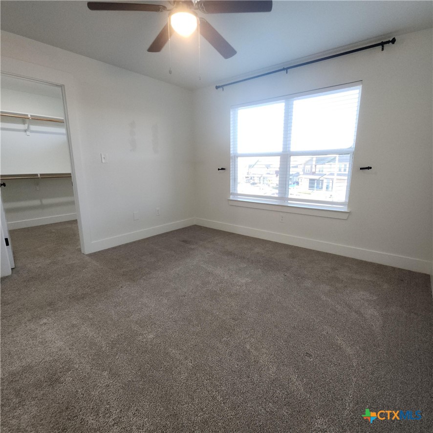 1952 Royal Loop Belton, TX 76513 - Photo 9 of 15 an empty room with a empty space and windows