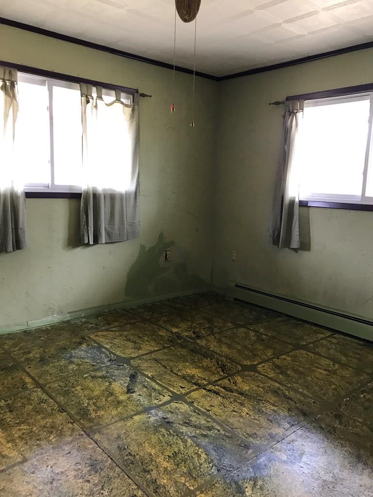 213 Stone Road Franklin, PA 16323 - Photo 18 of 28 a view of an empty room and window