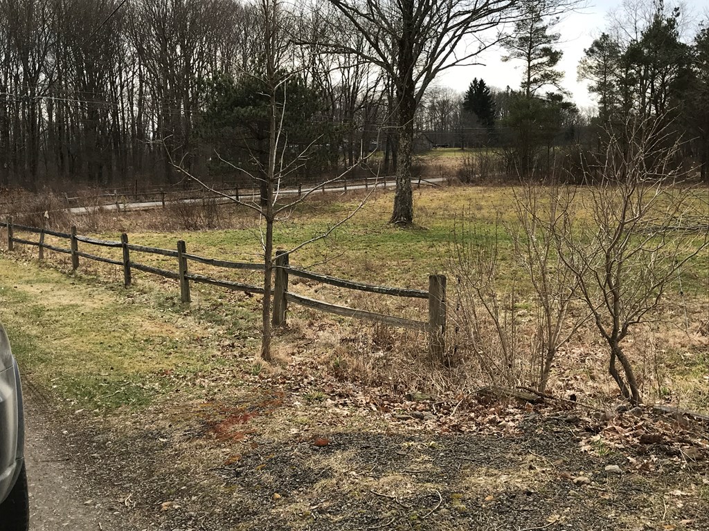 213 Stone Road Franklin, PA 16323 - Photo 8 of 28 a view of a garden with a bench
