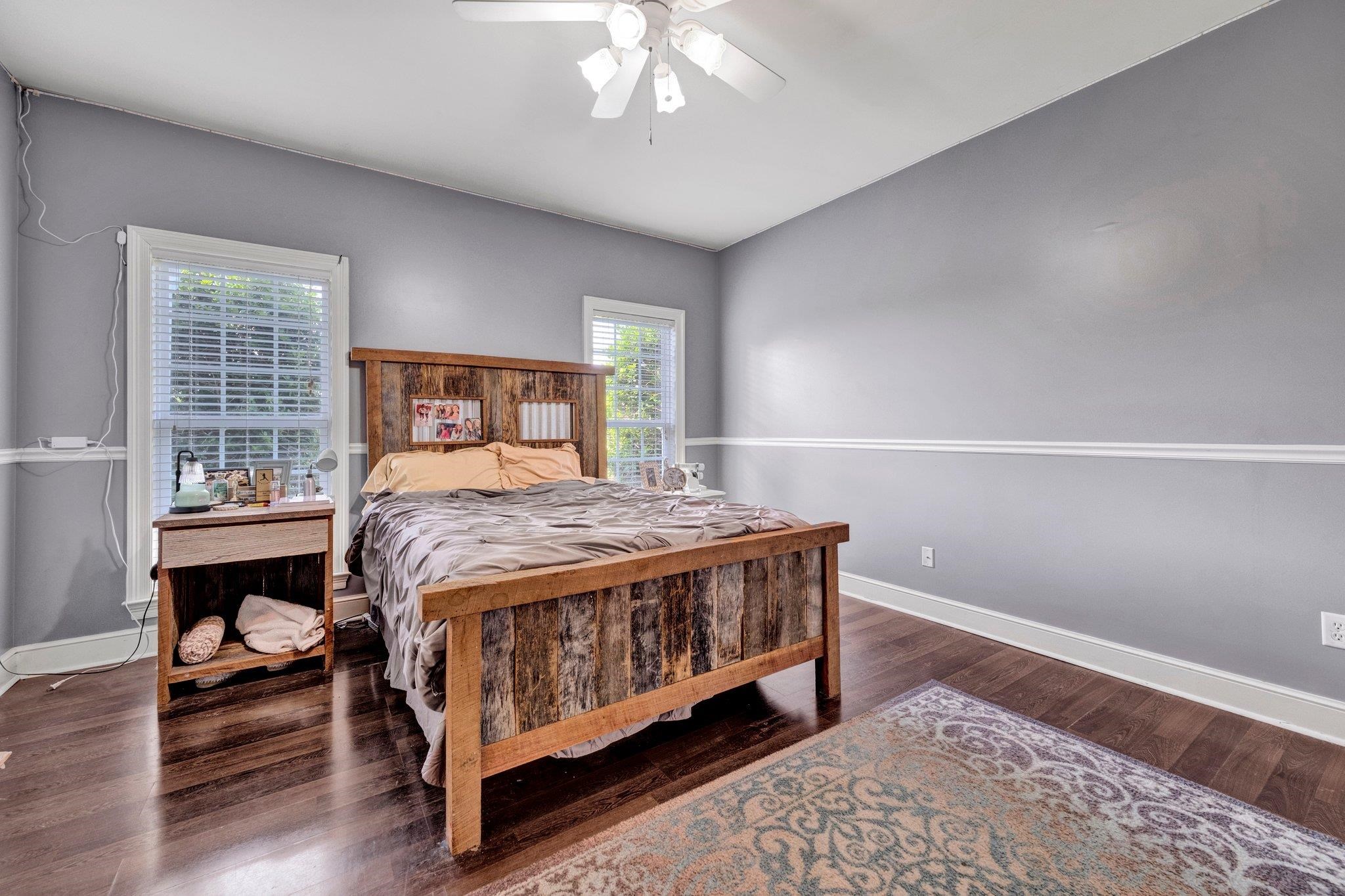 914 Beaver Creek Road Brighton, TN 38011 - Photo 19 of 38 a bed sitting in a bedroom next to a window