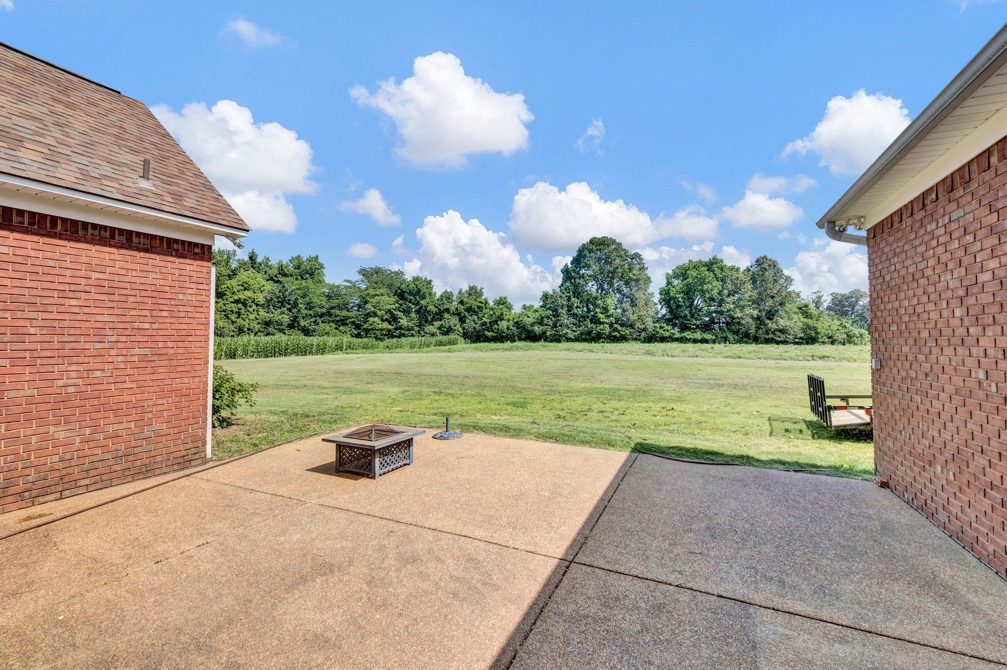 914 Beaver Creek Road Brighton, TN 38011 - Photo 29 of 38 a view of a lake with a yard