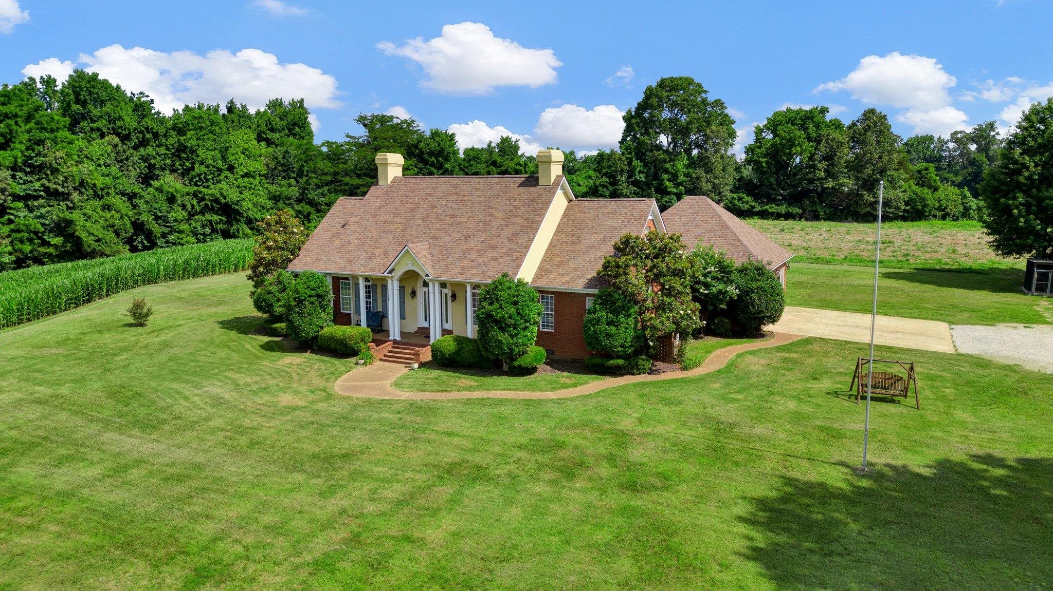 914 Beaver Creek Road Brighton, TN 38011 - Photo 3 of 38 a view of an house with backyard space and garden