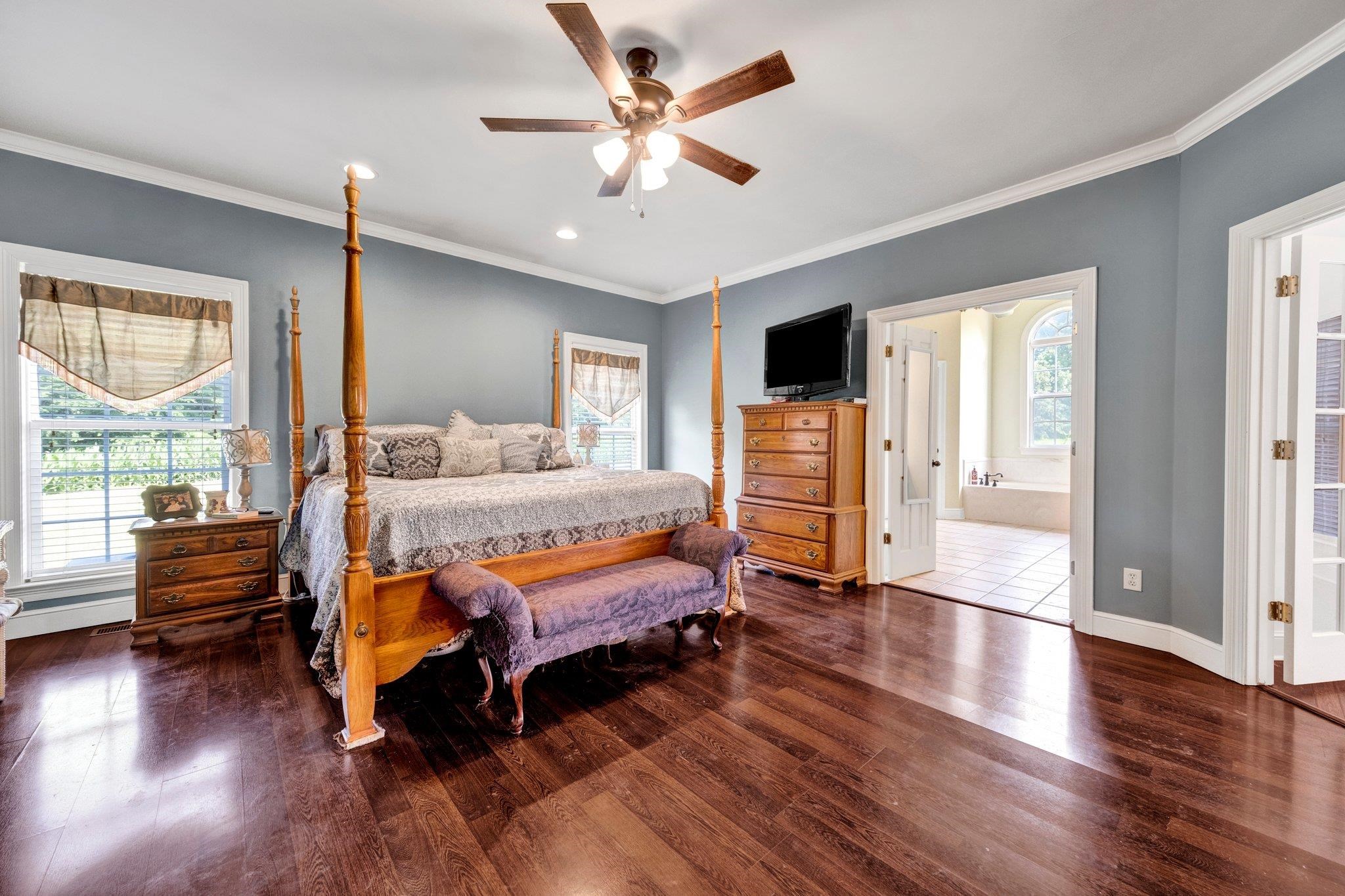 914 Beaver Creek Road Brighton, TN 38011 - Photo 5 of 38 a bedroom with furniture and wooden floor