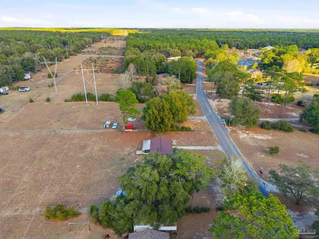 a view of a road with a yard
