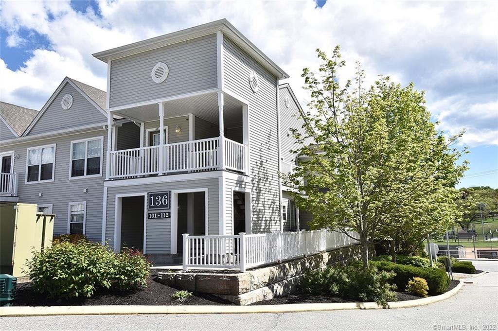 Unit #108 enjoys all the entry area & porch by itself, leading to its upper level location