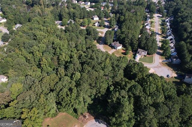 9142 Ford Street Southwest Covington, GA 30014 - Photo 9 of 12 an aerial view of a house with a yard
