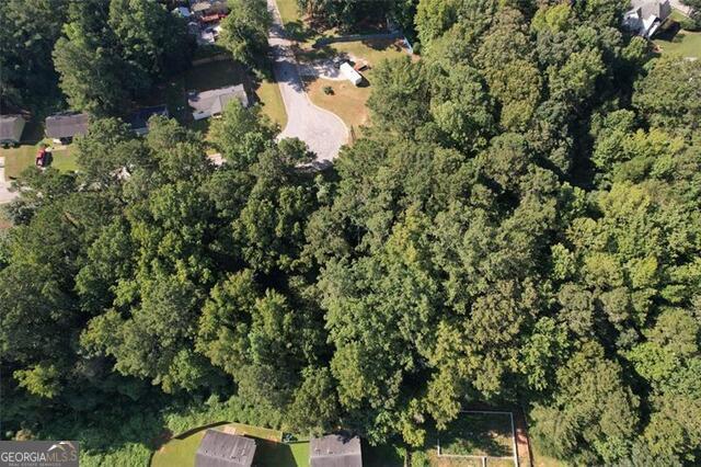 9142 Ford Street Southwest Covington, GA 30014 - Photo 10 of 12 a view of a tree in a yard