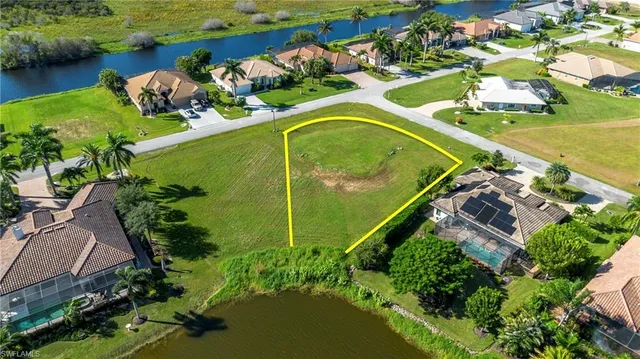 an aerial view of a pool yard swimming pool and outdoor seating