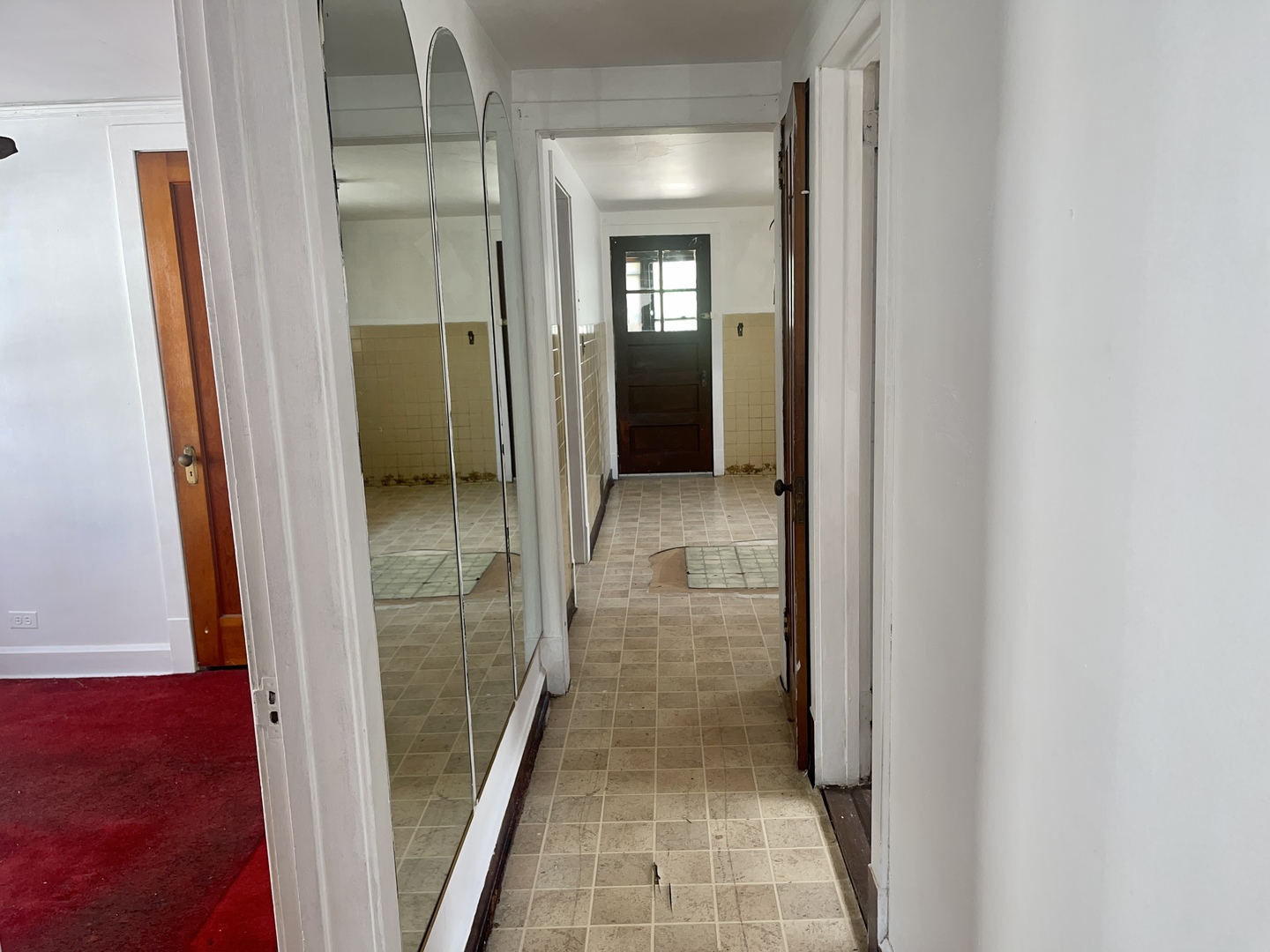 7017 South Wood Street Chicago, IL 60636 - Photo 16 of 25 a view of a bathroom from a hallway