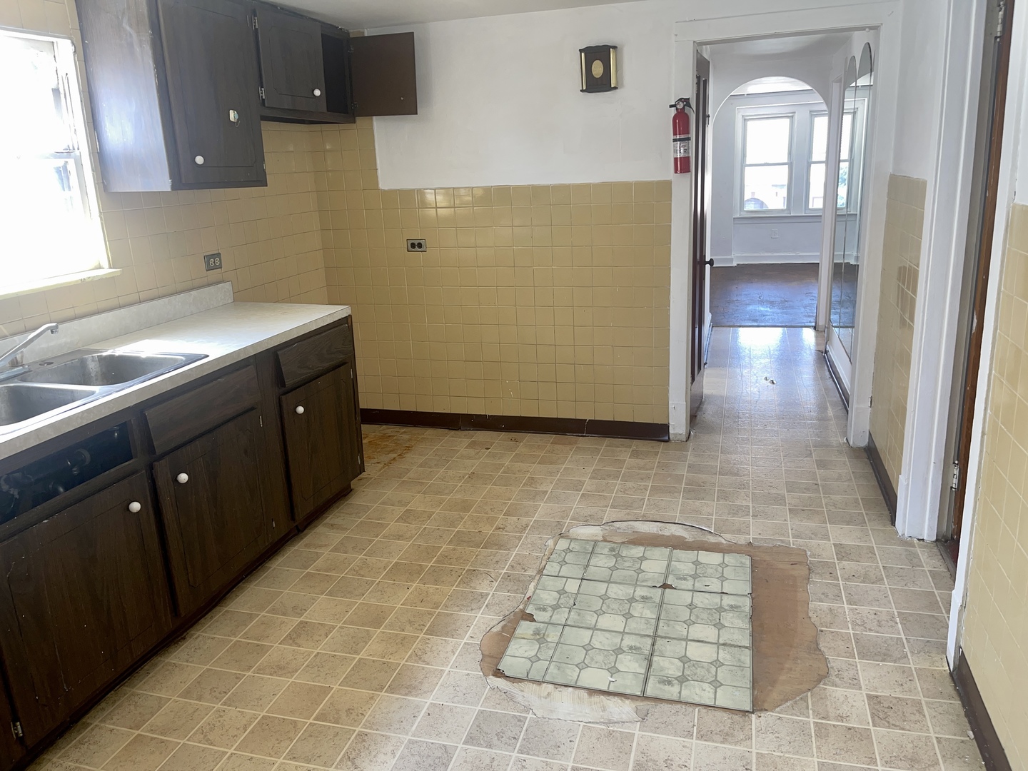 7017 South Wood Street Chicago, IL 60636 - Photo 21 of 25 a bathroom with a sink and a mirror