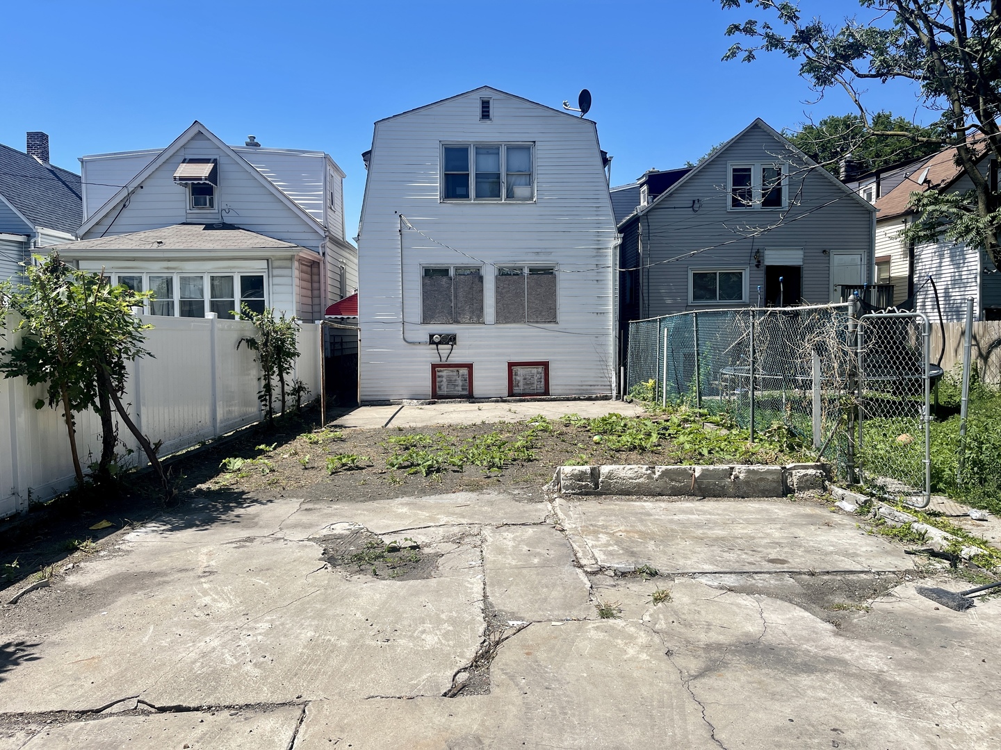 7017 South Wood Street Chicago, IL 60636 - Photo 25 of 25 front view of a house with a yard